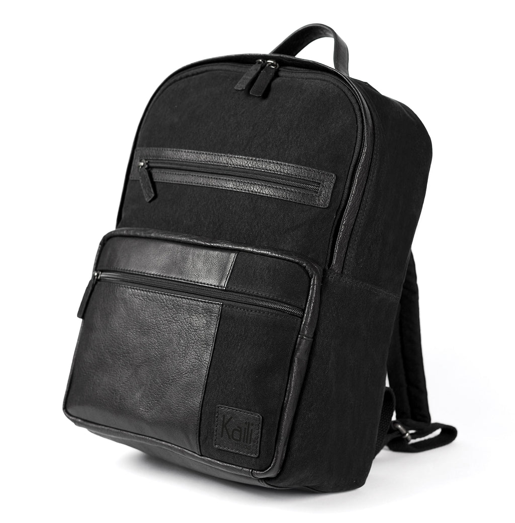 K0023AB | Canvas/Vera Leather Notebook Backpack, full grain, flyaway - Black Color. Nickel Antique accessories, Zipper closure. Dimensions: 29 x 40 x15 cm. Packaging: Tnt bag
