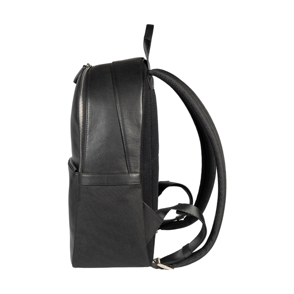 RB2001A | Netbook/Tablet Carrier Backpack in Nylon/Vera Leather, with light grain. Zipper closure and adjustable shoulder straps - Black color - Dimensions: 27 x 38 x 14 cm. Packaging: Non-Woven Fabric Bag